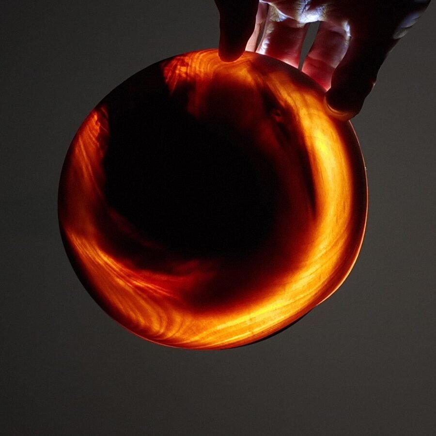 Light shining through finely turned Birch Bowl