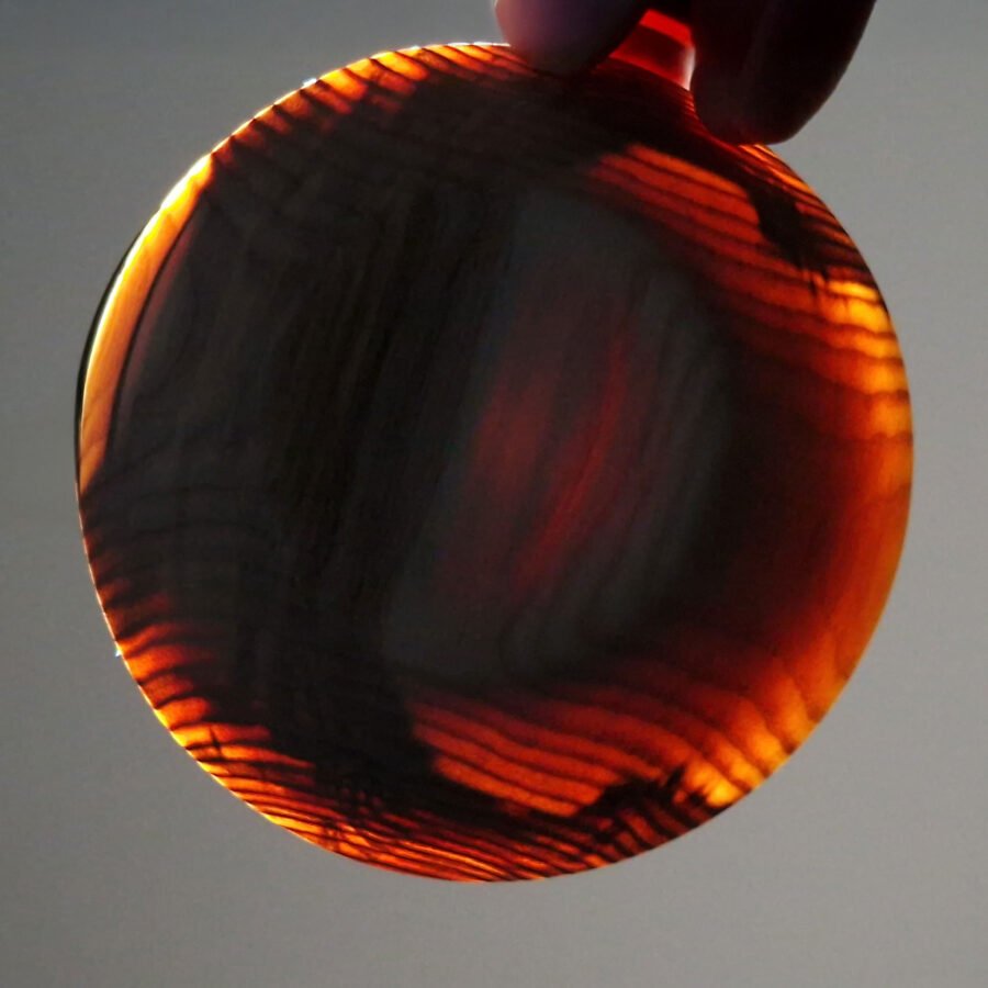 Light shining through thinly turned wooden ash bowl