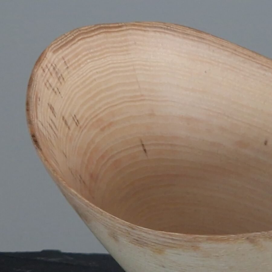 Close up of this natural edge ash wooded bowl