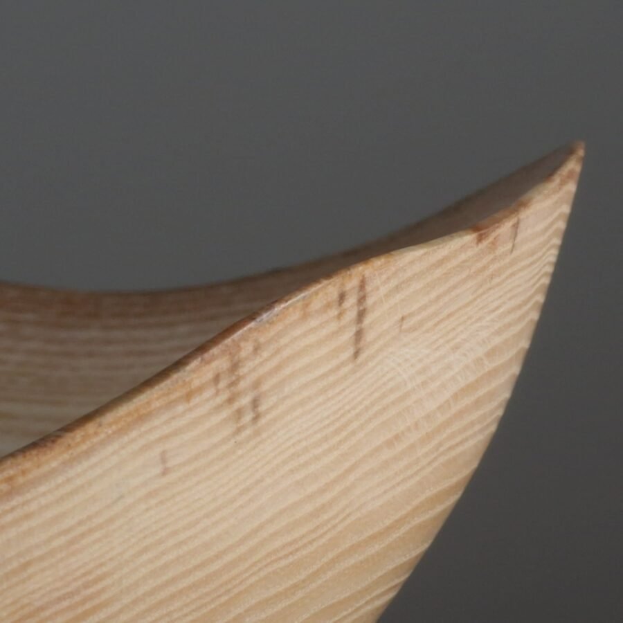 Close up of natural edge ash wood bowl
